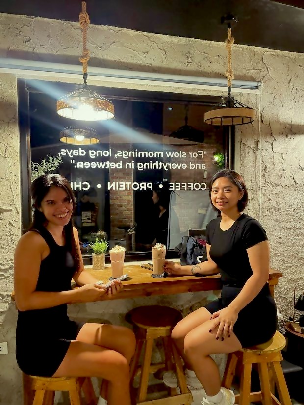 Two guests at the window bar after training